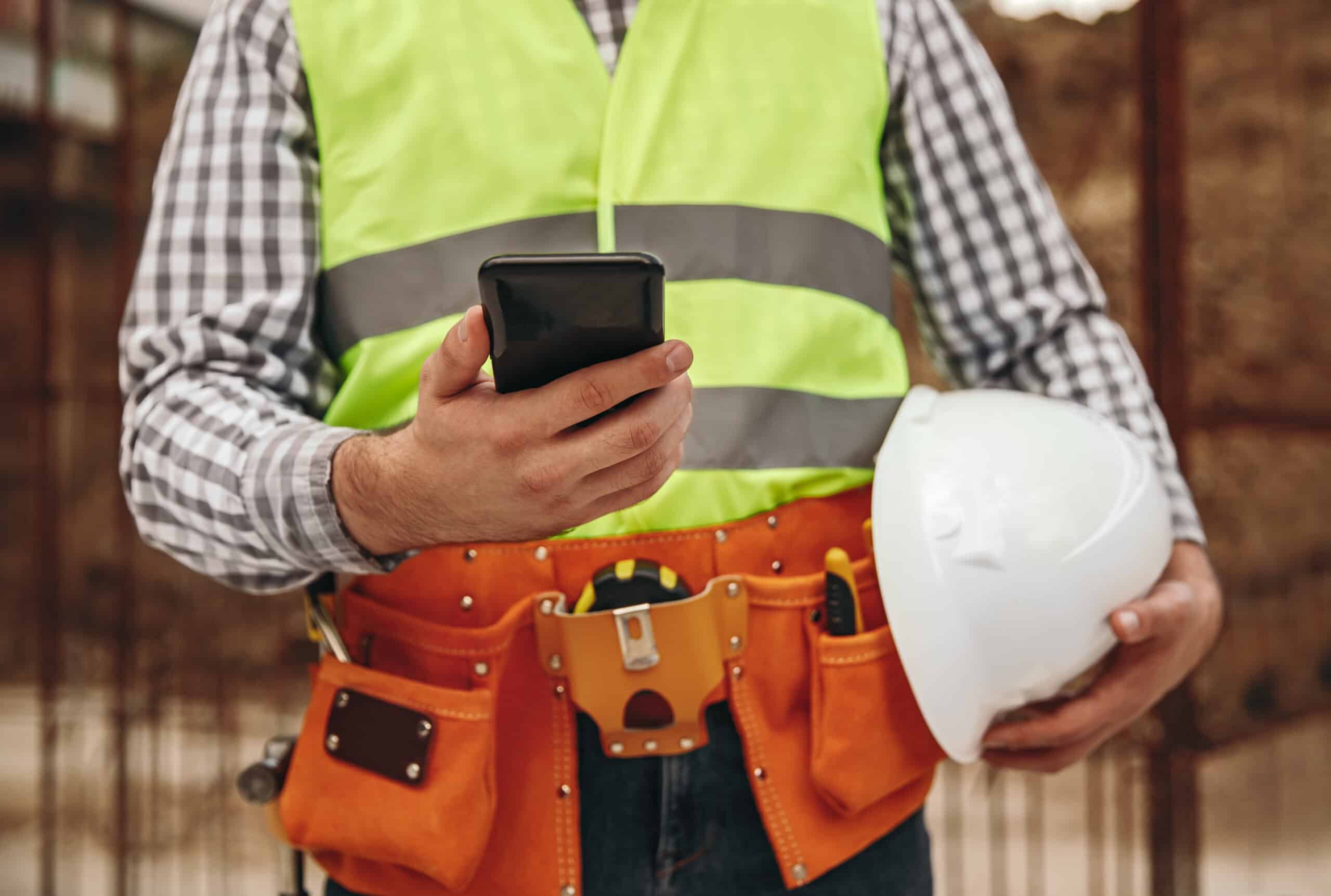 contractor using smartphone